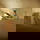 Philips Hue Bluetooth White Ambiance LED Tischleuchte Iris Special Edition in Gold un Transparent 8,2W 570lm