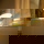 Philips Hue Bluetooth White Ambiance LED Tischleuchte Iris Special Edition in Gold un Transparent 8,2W 570lm